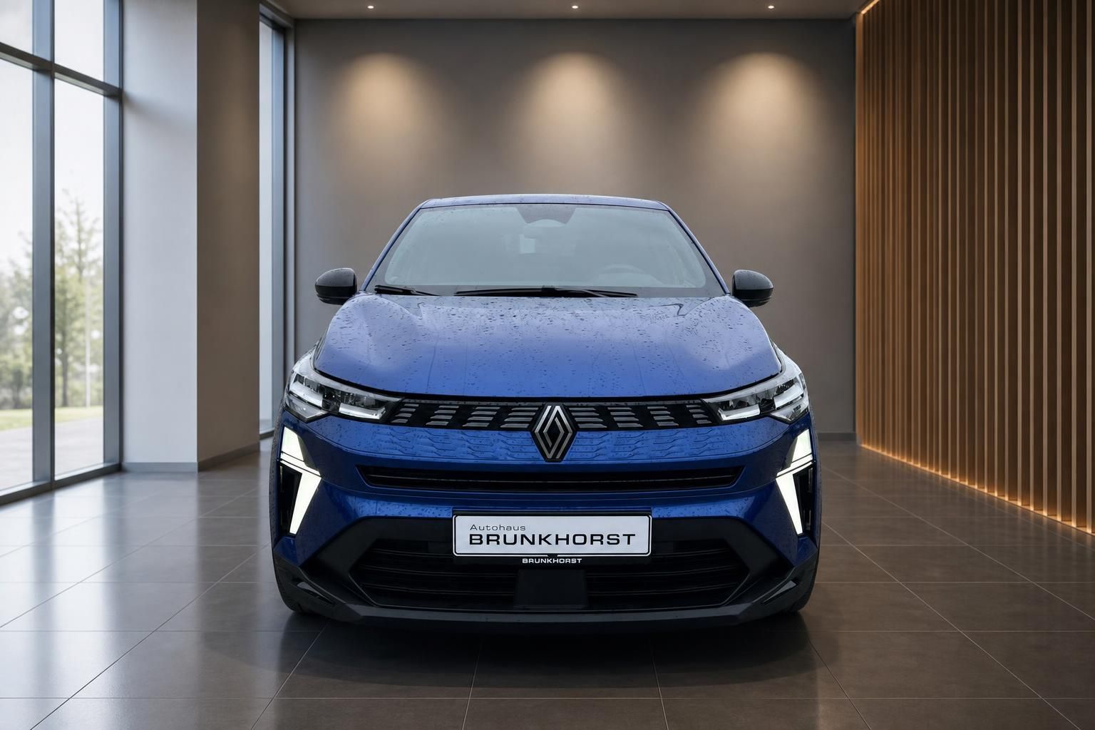 Renault Symbioz E-Tech Front - blaues Elektro-SUV mit LED-Tagfahrlicht und Autohaus Brunkhorst Kennzeichen