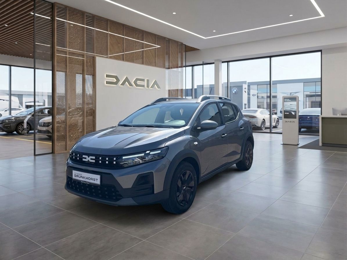 Dacia Sandero grauer SUV im modernen Autohaus-Showroom bei Brunkhorst mit Glasfront