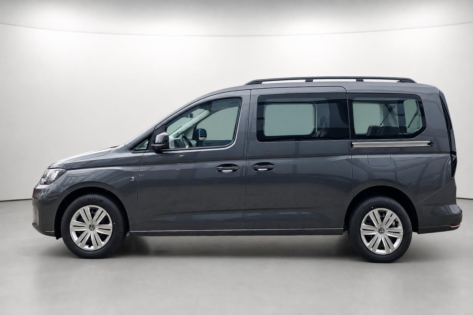 VW Caddy grau Seitenansicht Neuwagen Studioaufnahme