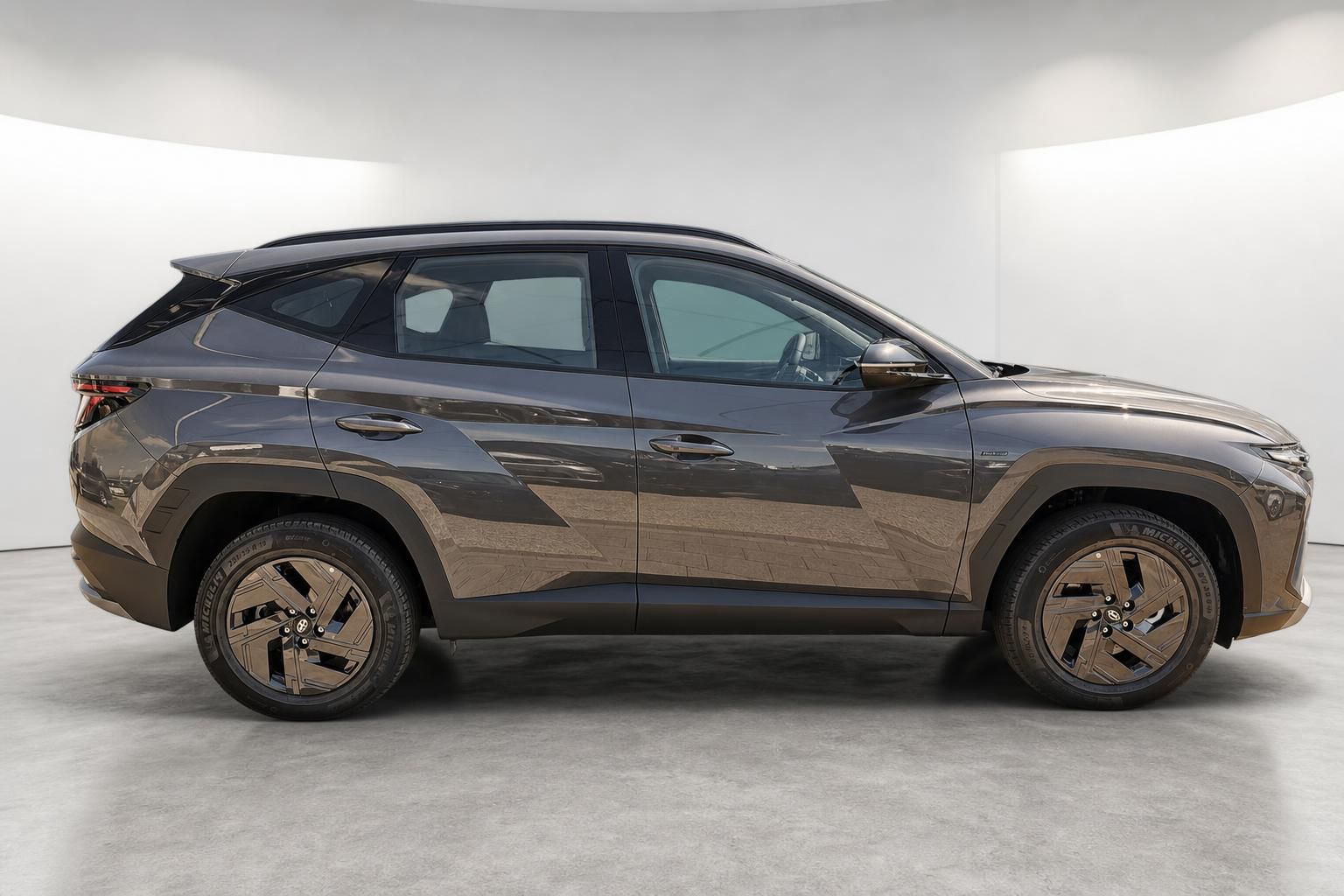 Hyundai Tucson Hybrid SUV in Braun, Seitenansicht Detailansicht