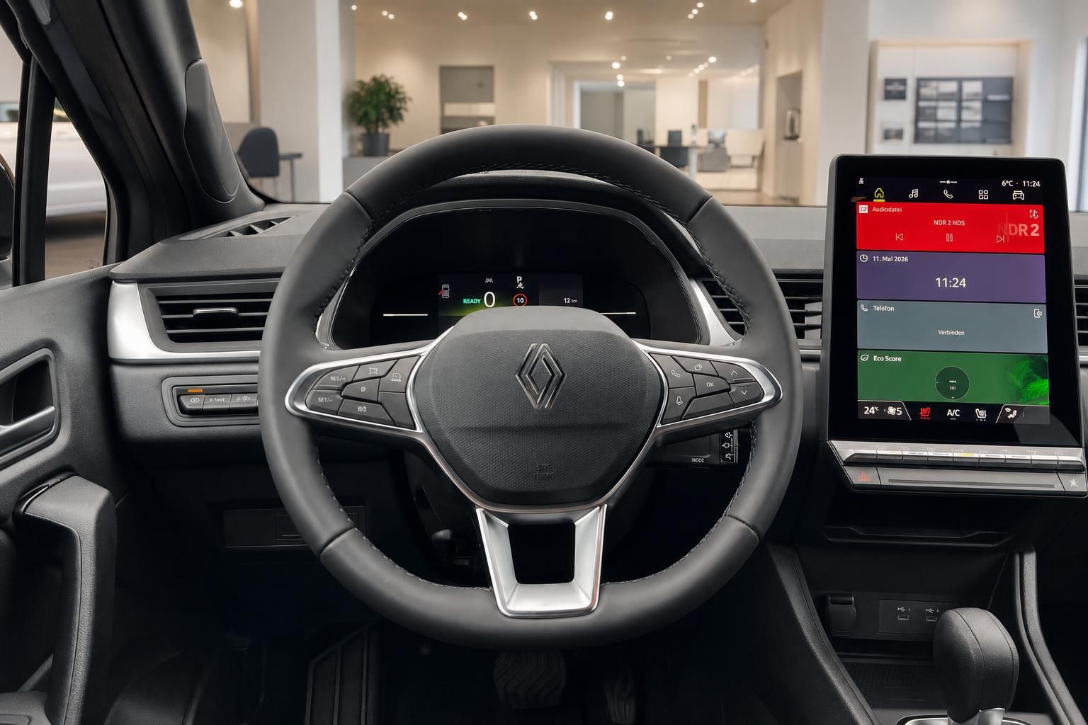 Renault Cockpit mit Lenkrad und Multimedia-Display im Innenraum