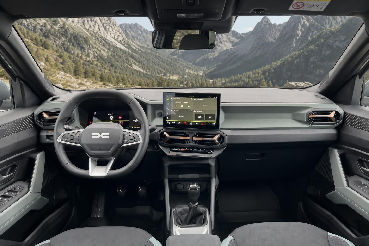 Dacia Bigster Innenraum - modernes Dashboard mit Touchscreen und Bergpanorama