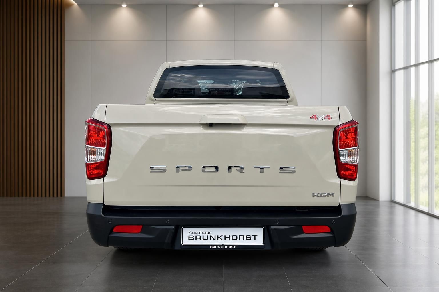 SsangYong Musso Pickup Truck beige Heckansicht mit Ladefläche