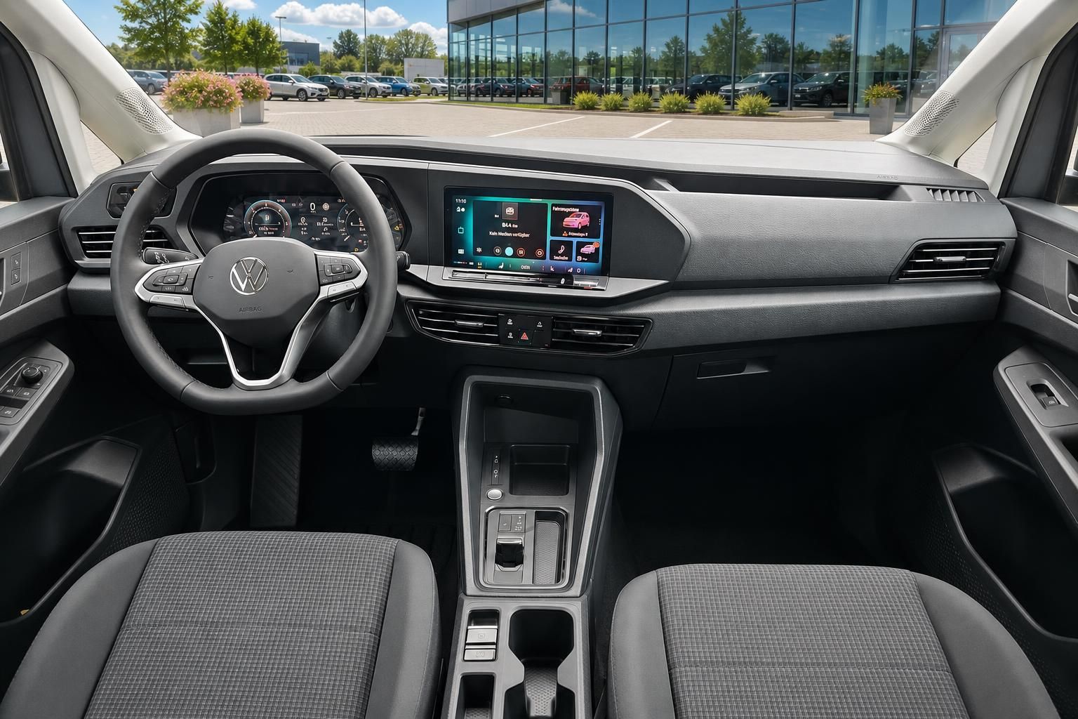 VW Cockpit mit Lenkrad und Infotainment-Display