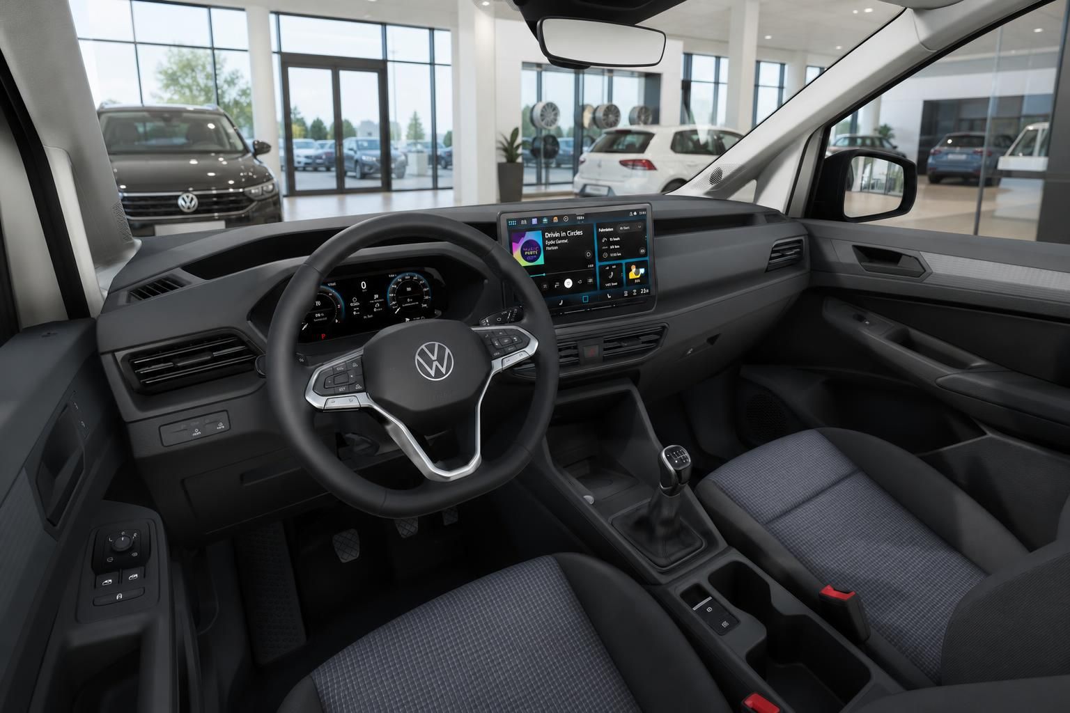 VW Cockpit mit Lenkrad, Digitaltacho und Infotainment-Display im Innenraum