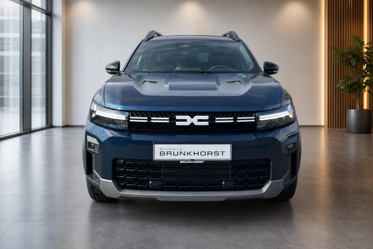 Dacia Bigster Frontansicht mit charakteristischem Kühlergrill und LED-Scheinwerfern