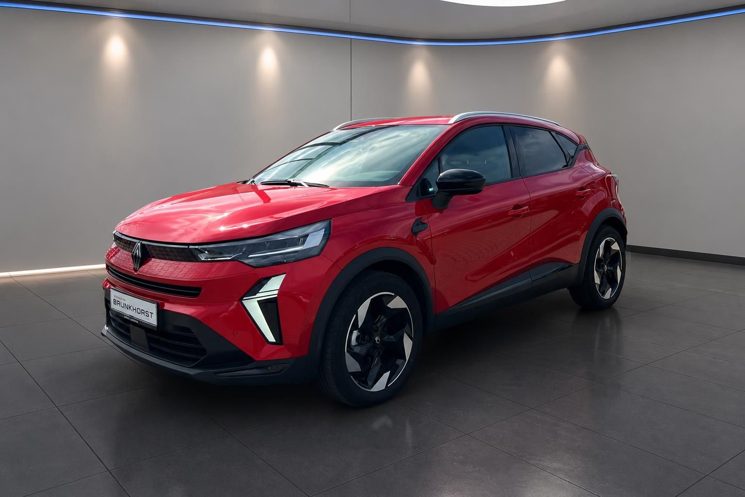 Renault Captur rot - Seitenansicht des kompakten SUVs mit modernem Design und Alufelgen