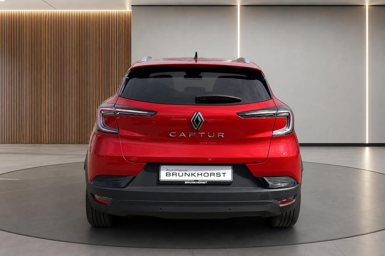 Renault Captur Heckansicht - rotes SUV mit CAPTUR Schriftzug und LED-Rückleuchten