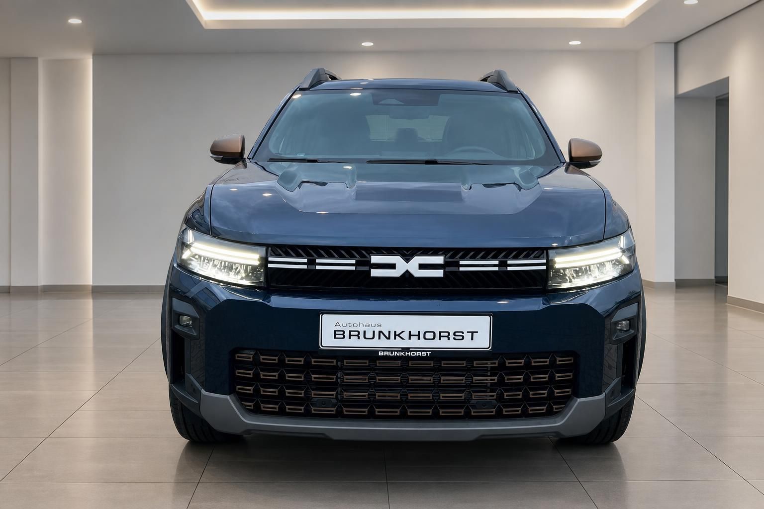 Dacia Bigster SUV Frontansicht in Dunkelblau mit modernem Kühlergrill und LED-Scheinwerfern