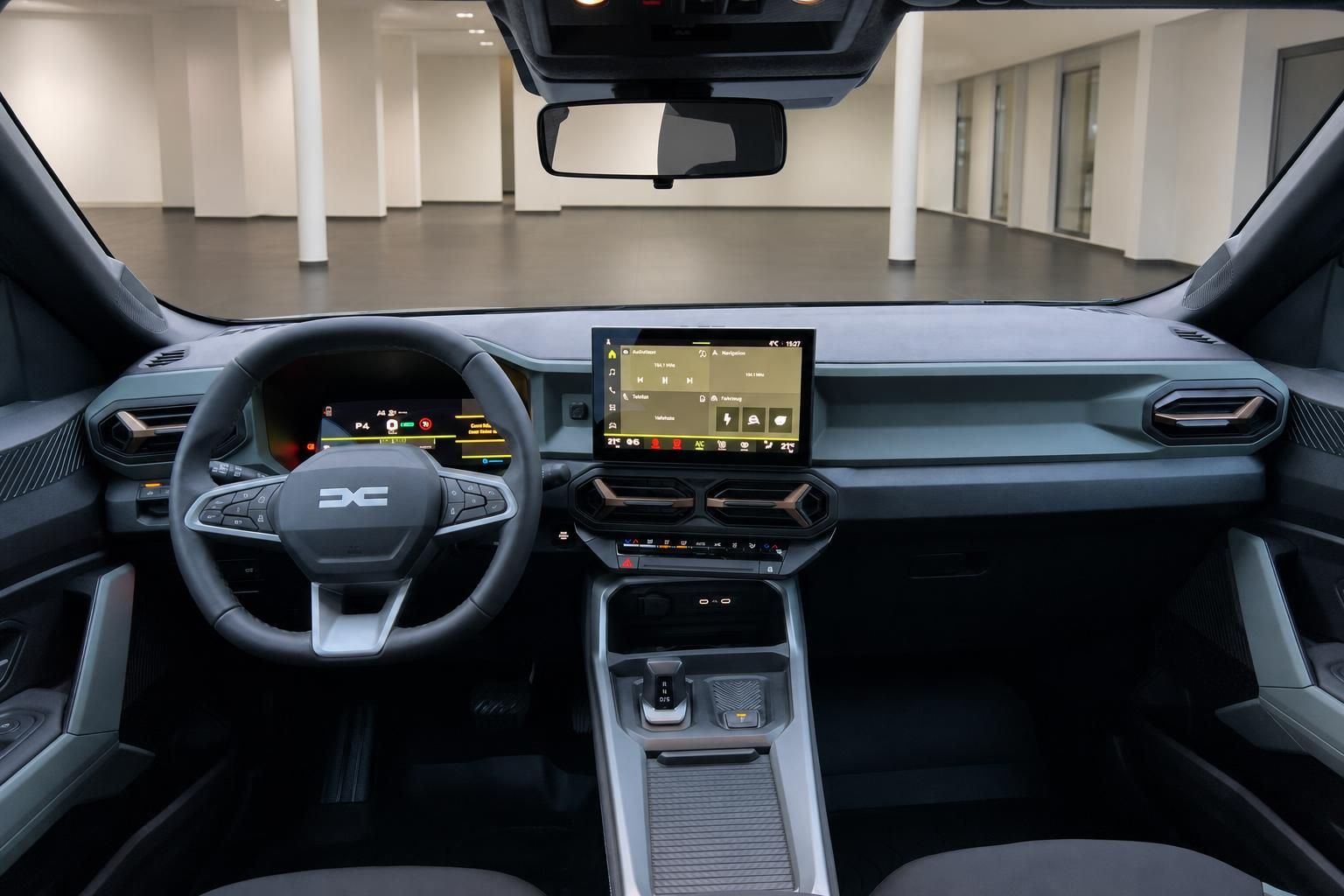 Dacia Bigster Innenraum mit digitalem Cockpit, Touchscreen-Display und modernem Lenkrad