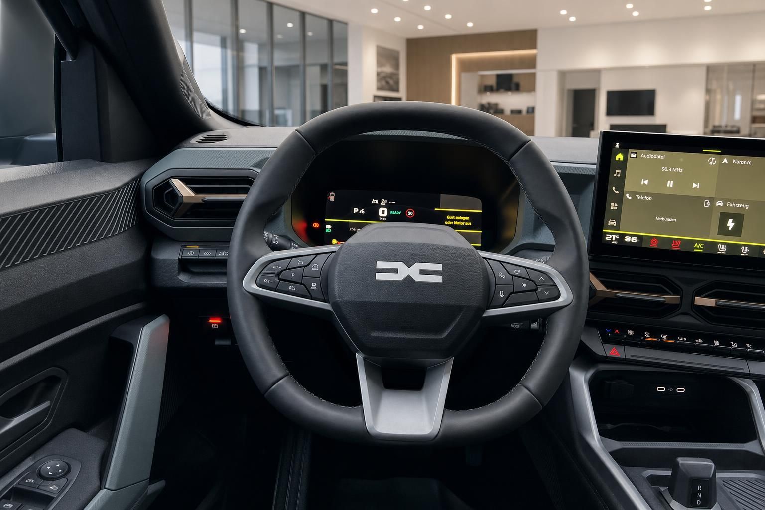 Modernes Fahrzeug-Cockpit mit digitalem Display und Lenkrad im Autohaus-Showroom