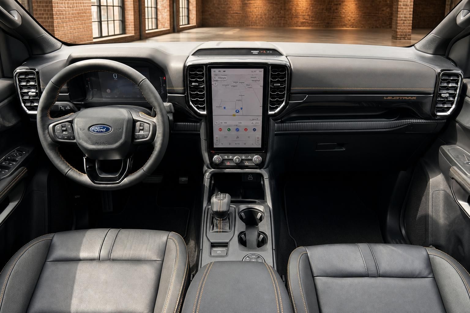 Ford Ranger Wildtrak Armaturenbrett mit großem Touchscreen und Lederausstattung in der Übersicht