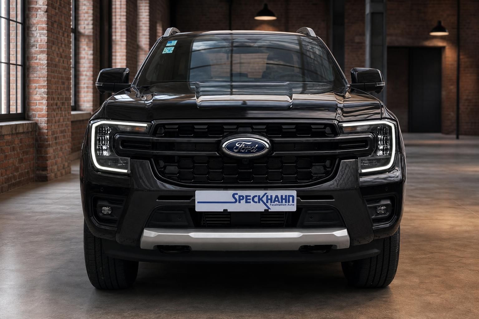 Ford Ranger Wildtrak schwarz Frontansicht – Pick-up mit LED-Scheinwerfern und Chromgrill im Studio