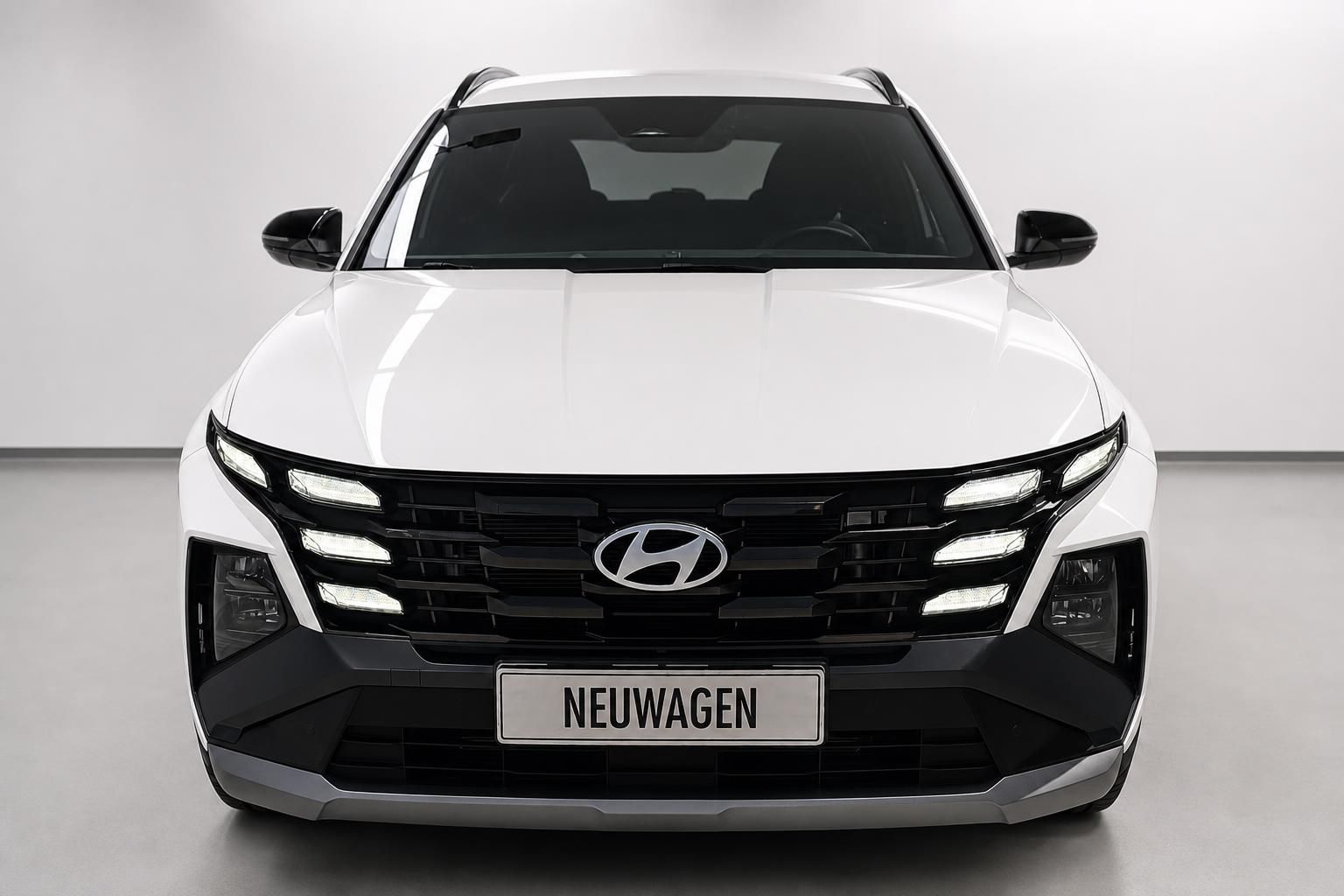 Hyundai Tucson in Weiß, Frontansicht mit Kühlergrill
