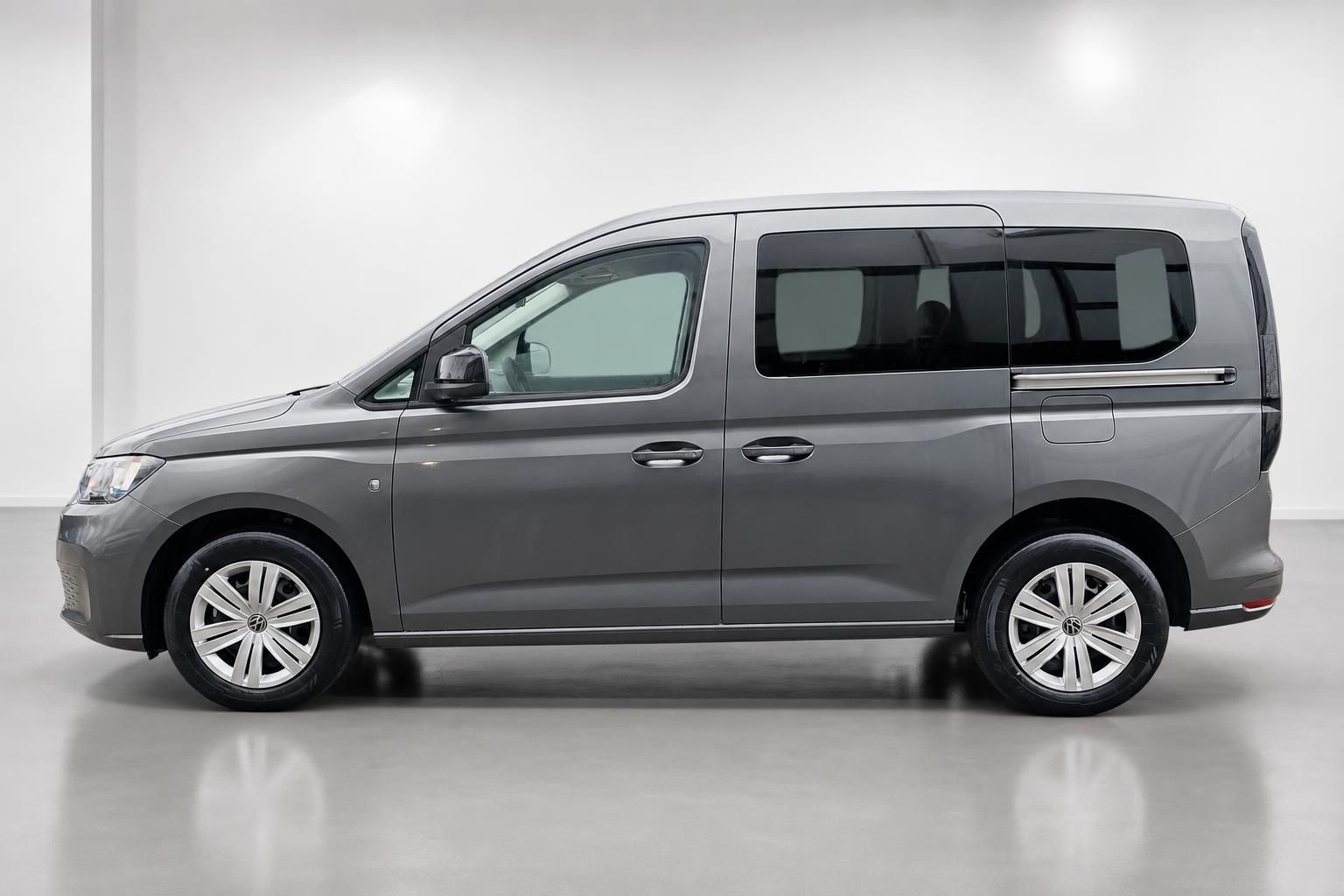 VW Caddy grau Seitenansicht Studioaufnahme