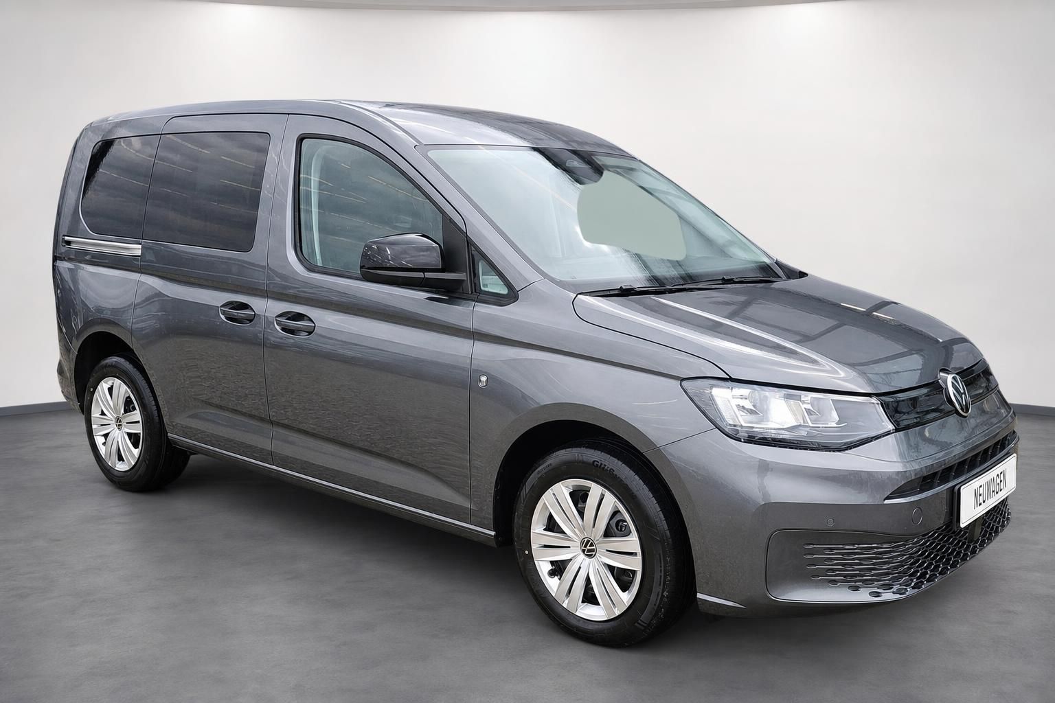 VW Caddy Grau Frontansicht schräg mit LED-Scheinwerfern