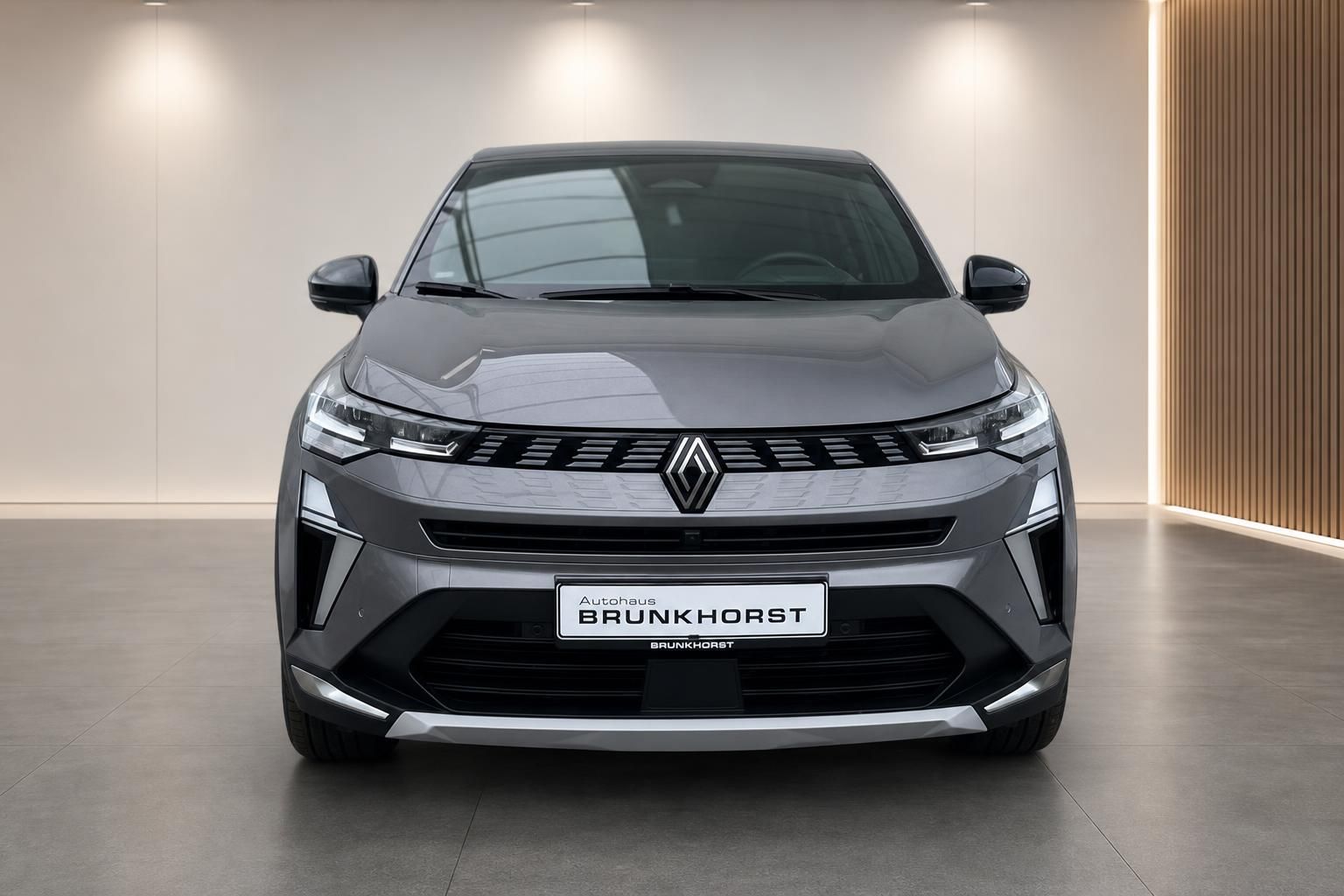 Renault Symbioz Frontansicht in Grau mit markantem Kuehlergrill