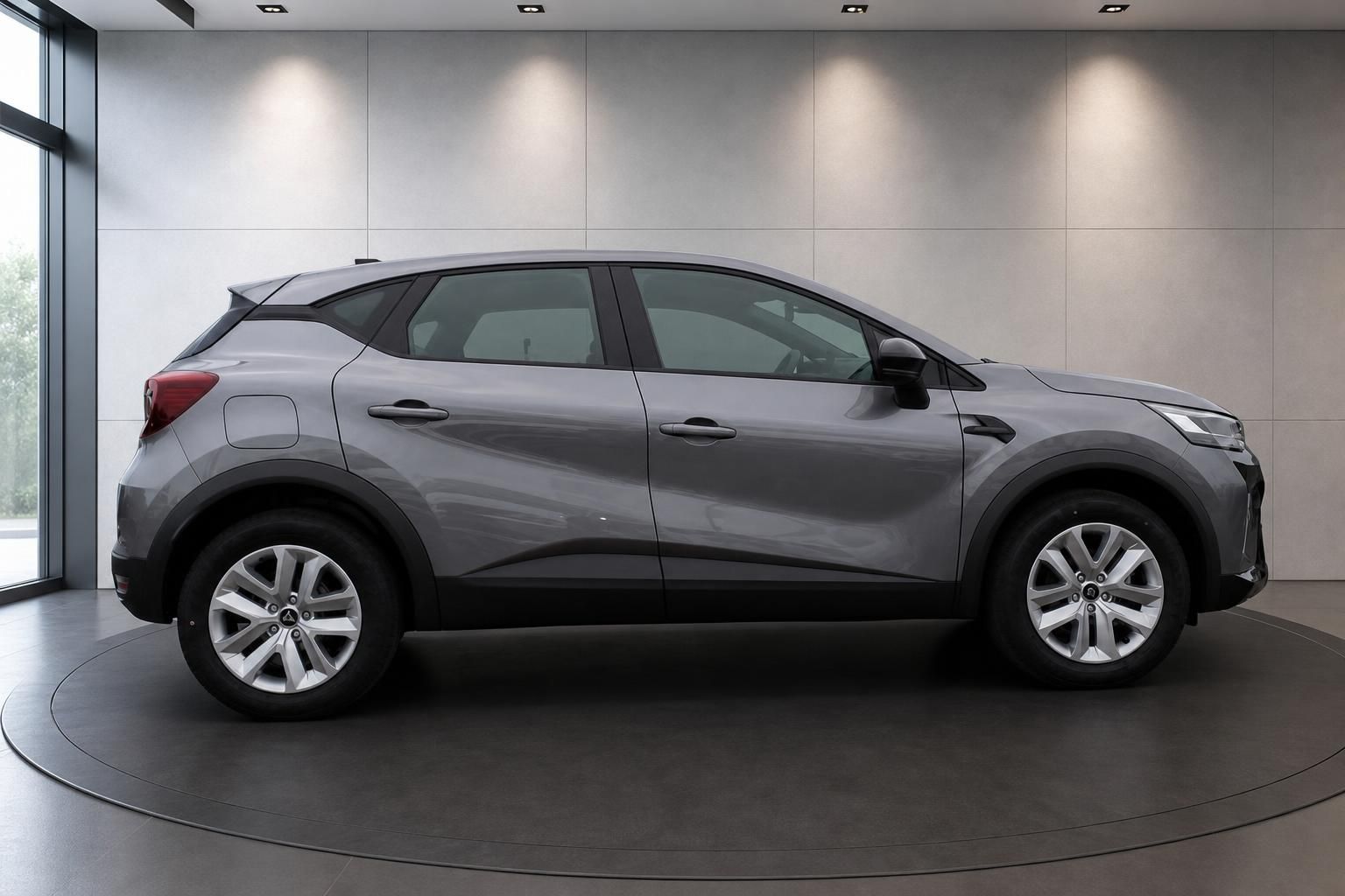 Renault Captur grau Seitenansicht links im Showroom – kompakter SUV