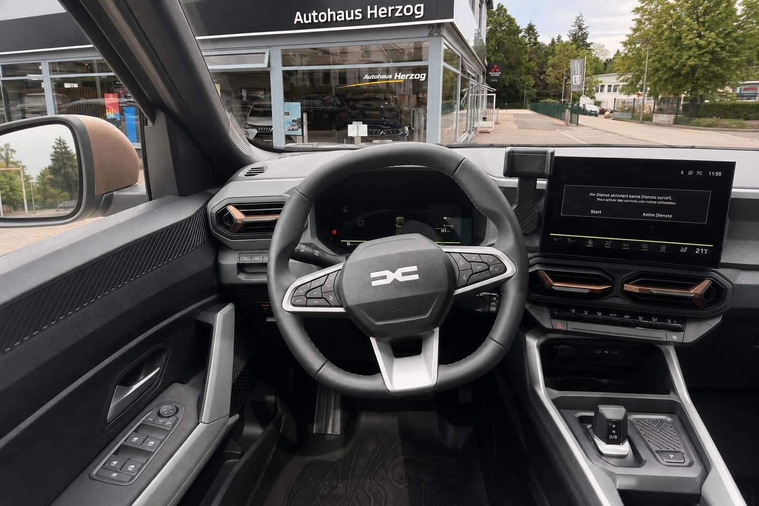 Fahrzeug Innenraum mit Lenkrad, Armaturenbrett und Infotainment-System