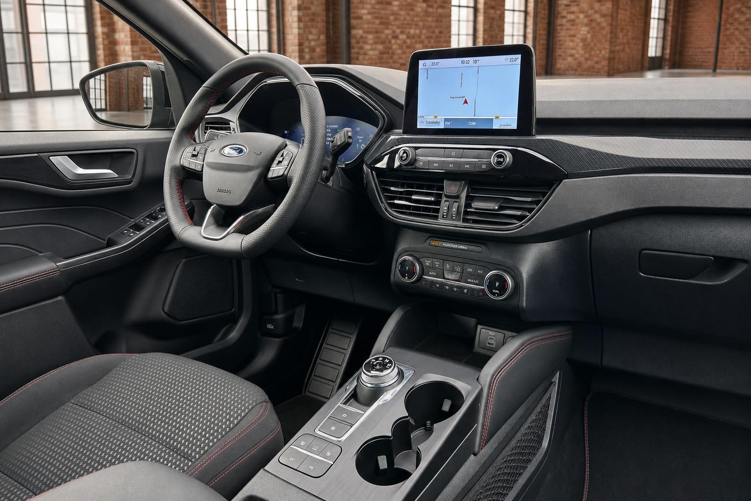 Ford Cockpit mit Lenkrad und Navigationssystem im Detail