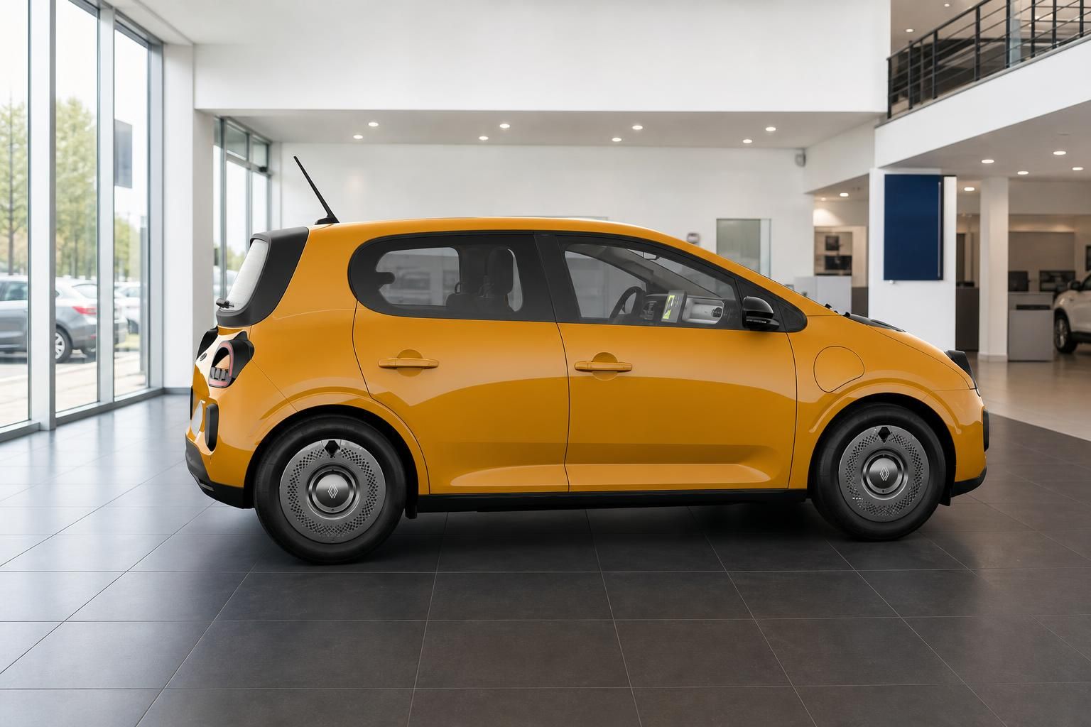 Renault Twingo in Gelb, Seitenansicht im Autohaus
