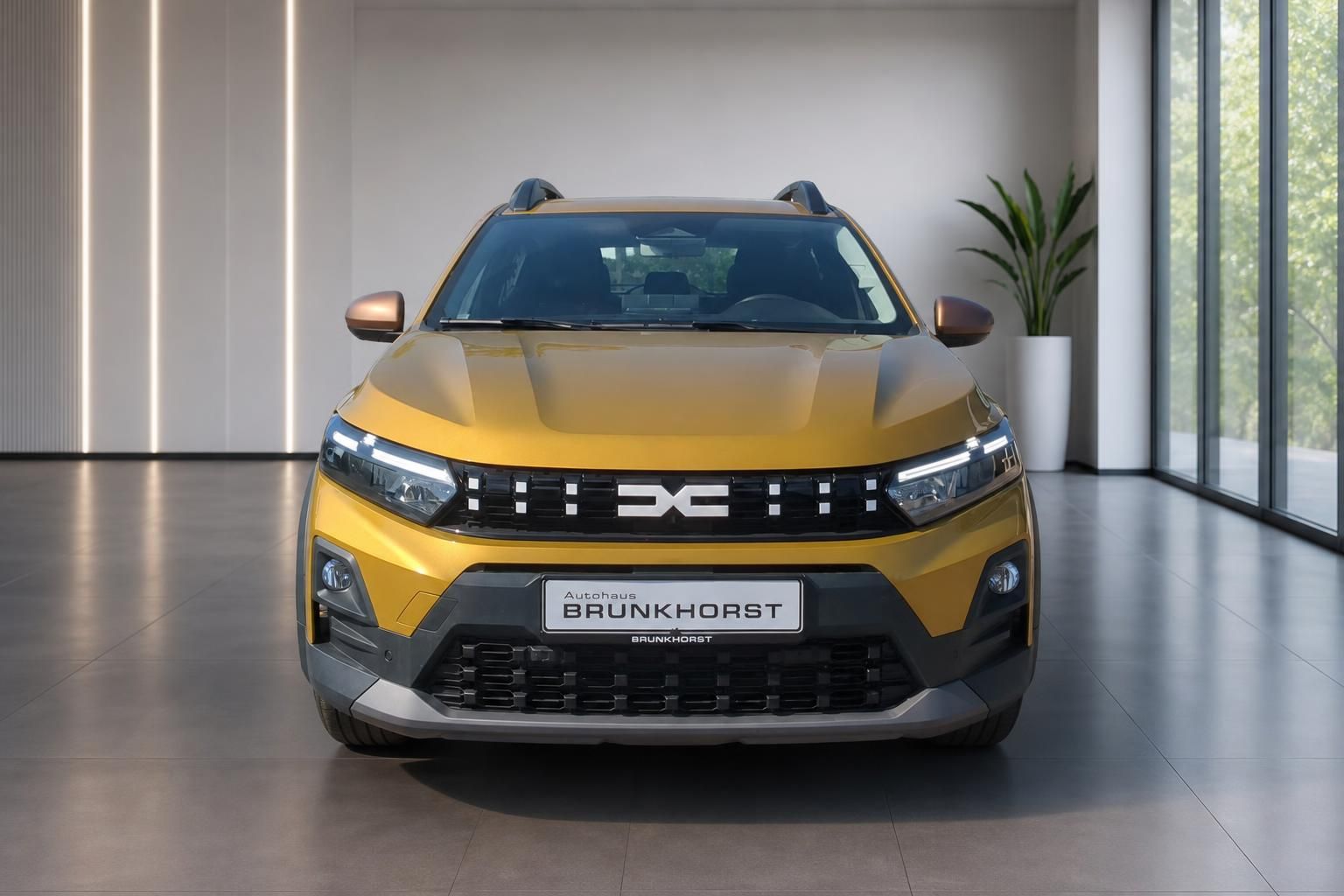 Dacia Sandero Stepway Gelb Frontansicht gerade im Showroom Autohaus Brunkhorst