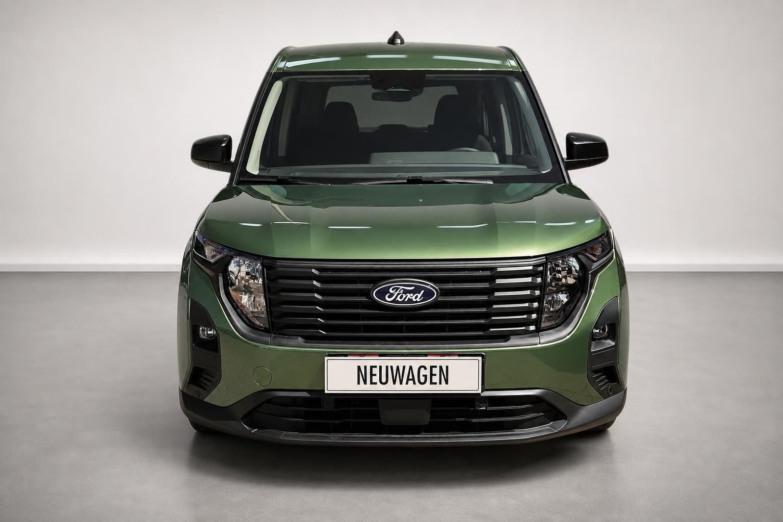 Ford Tourneo Courier gruen, Frontalansicht mit Kuehlergrill