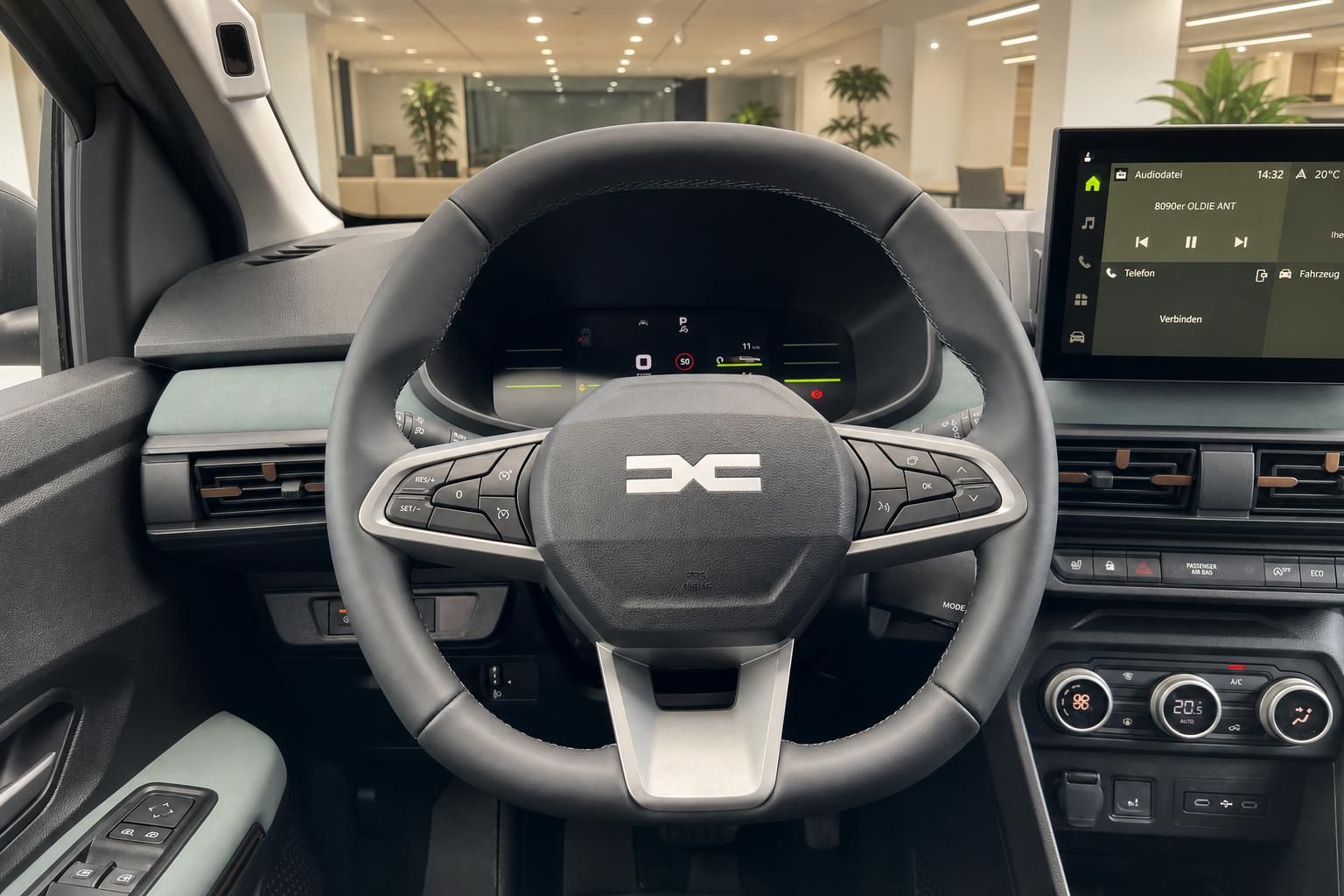 Modernes Fahrzeug-Cockpit mit Lenkrad, digitalem Armaturenbrett und Touchscreen-Infotainmentsystem