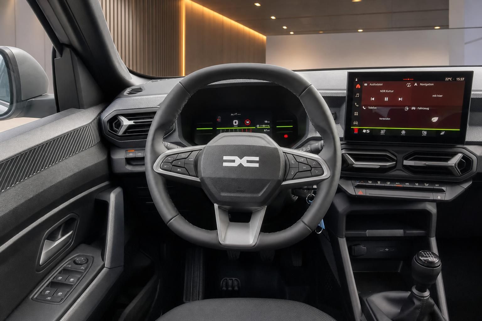 Dacia Cockpit mit Lenkrad und digitalem Infotainment-Display