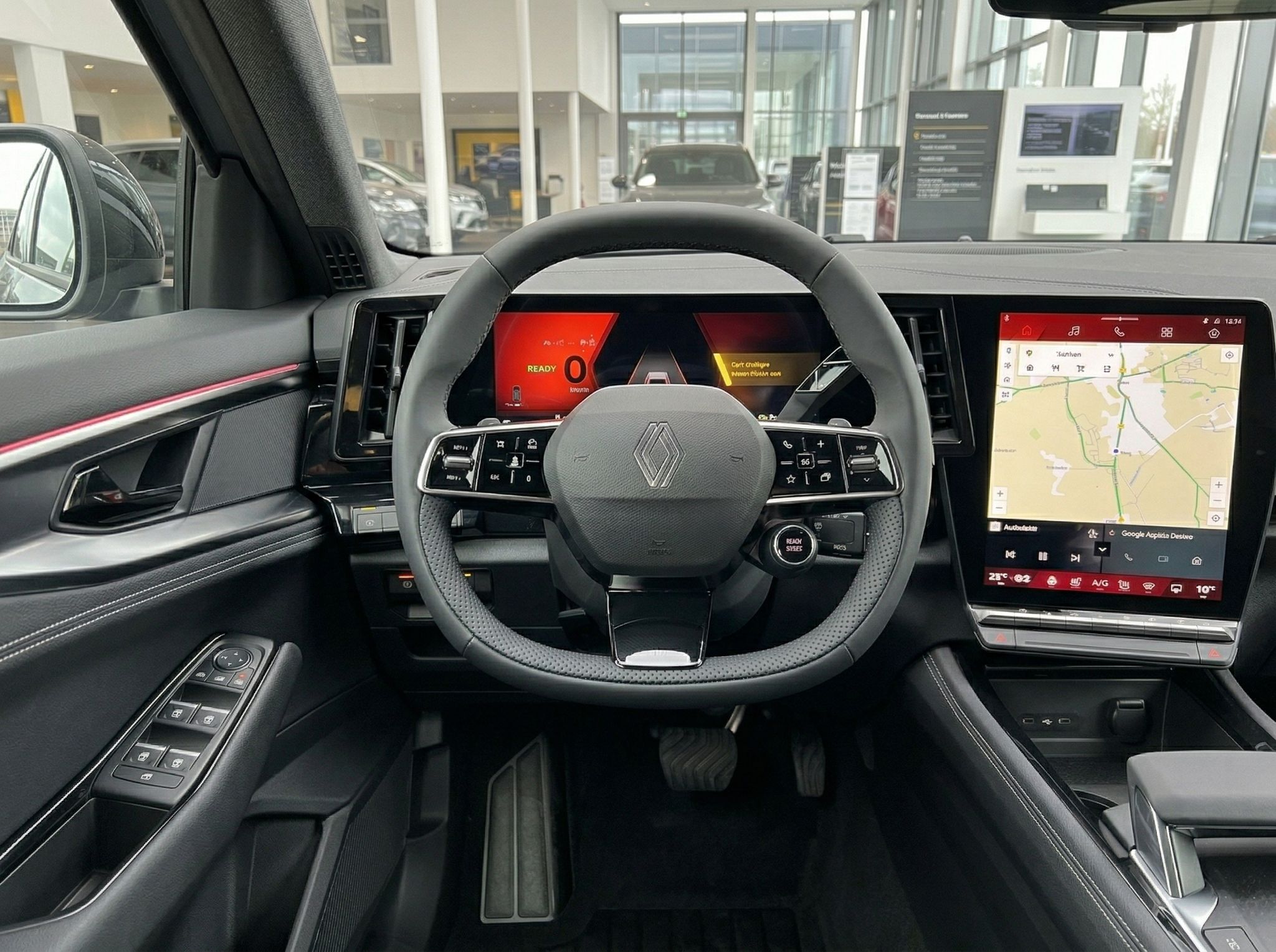 Renault Armaturenbrett mit digitalem Tacho, Touchscreen-Navigation und modernem Lenkrad Detail