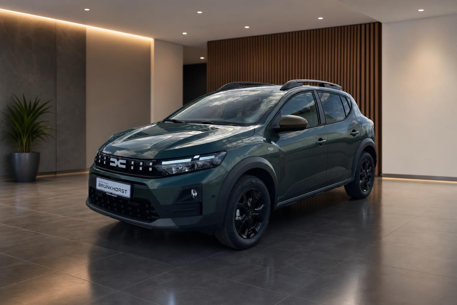 Dacia Sandero Stepway seitliche Dreiviertelansicht in grüner Metallic-Lackierung im Autohaus