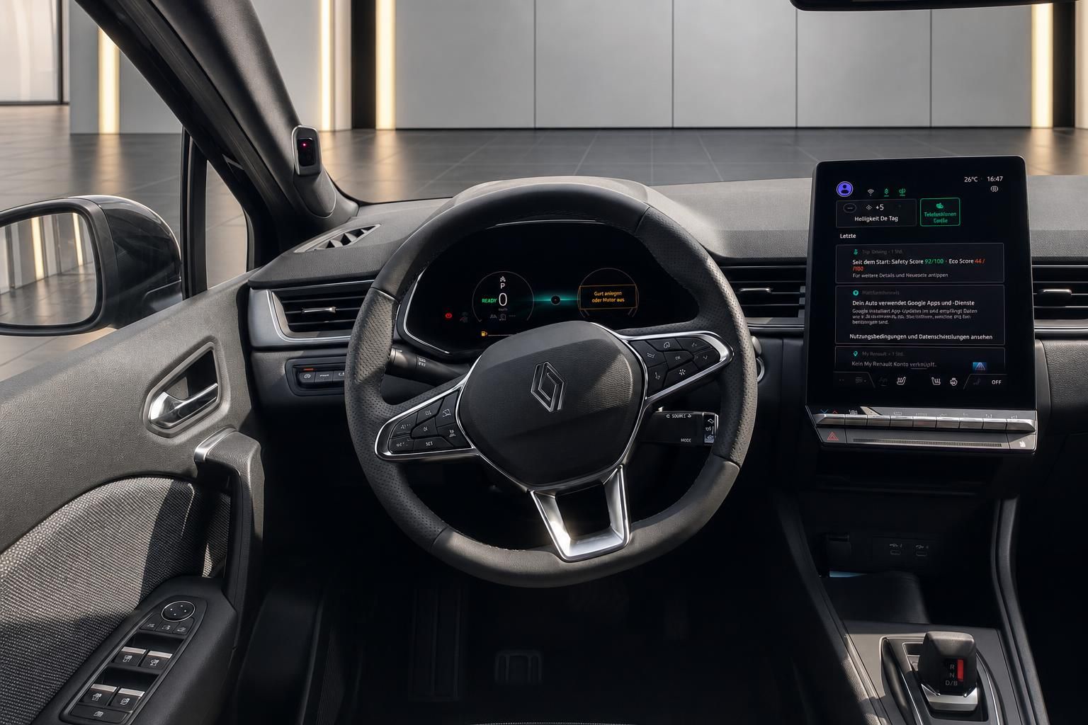 Renault Cockpit mit Lenkrad, digitalem Kombiinstrument und großem Touchscreen-Infotainmentsystem
