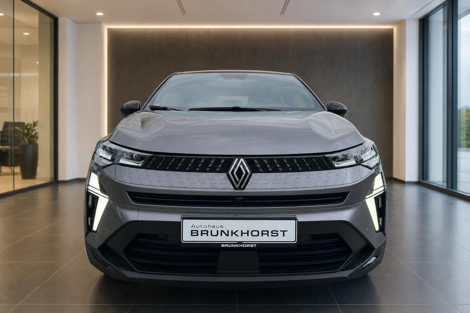 Renault Captur Frontansicht in grau mit LED-Scheinwerfern und modernem Design