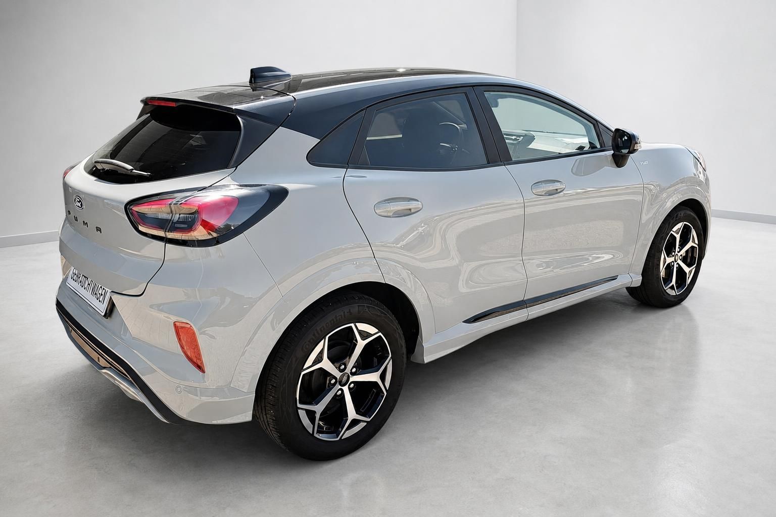 Ford Puma Heck-Seitenansicht in Grau als Gebrauchtwagen