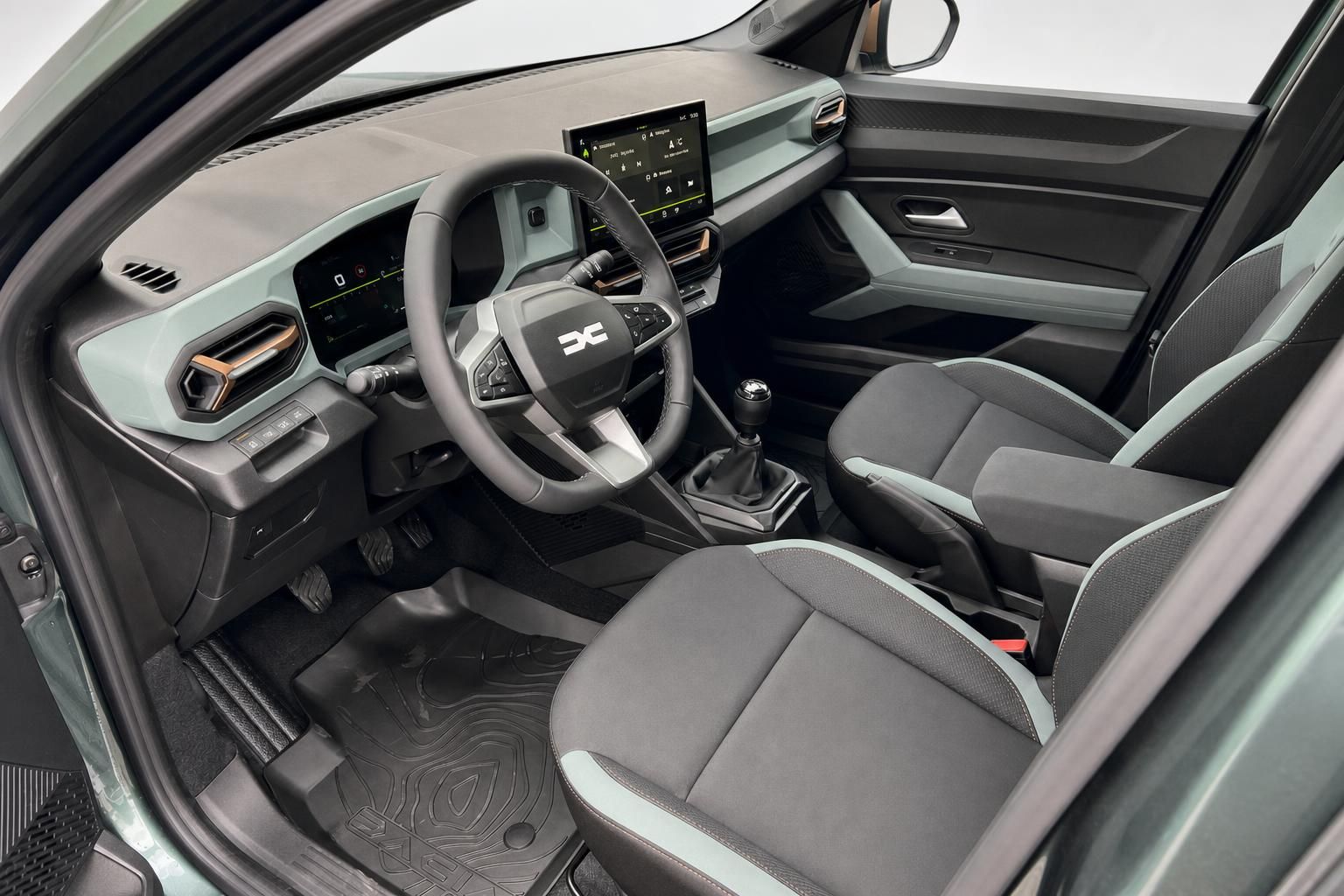 Dacia Innenraum mit Lenkrad, Touchscreen und modernem Cockpit Design