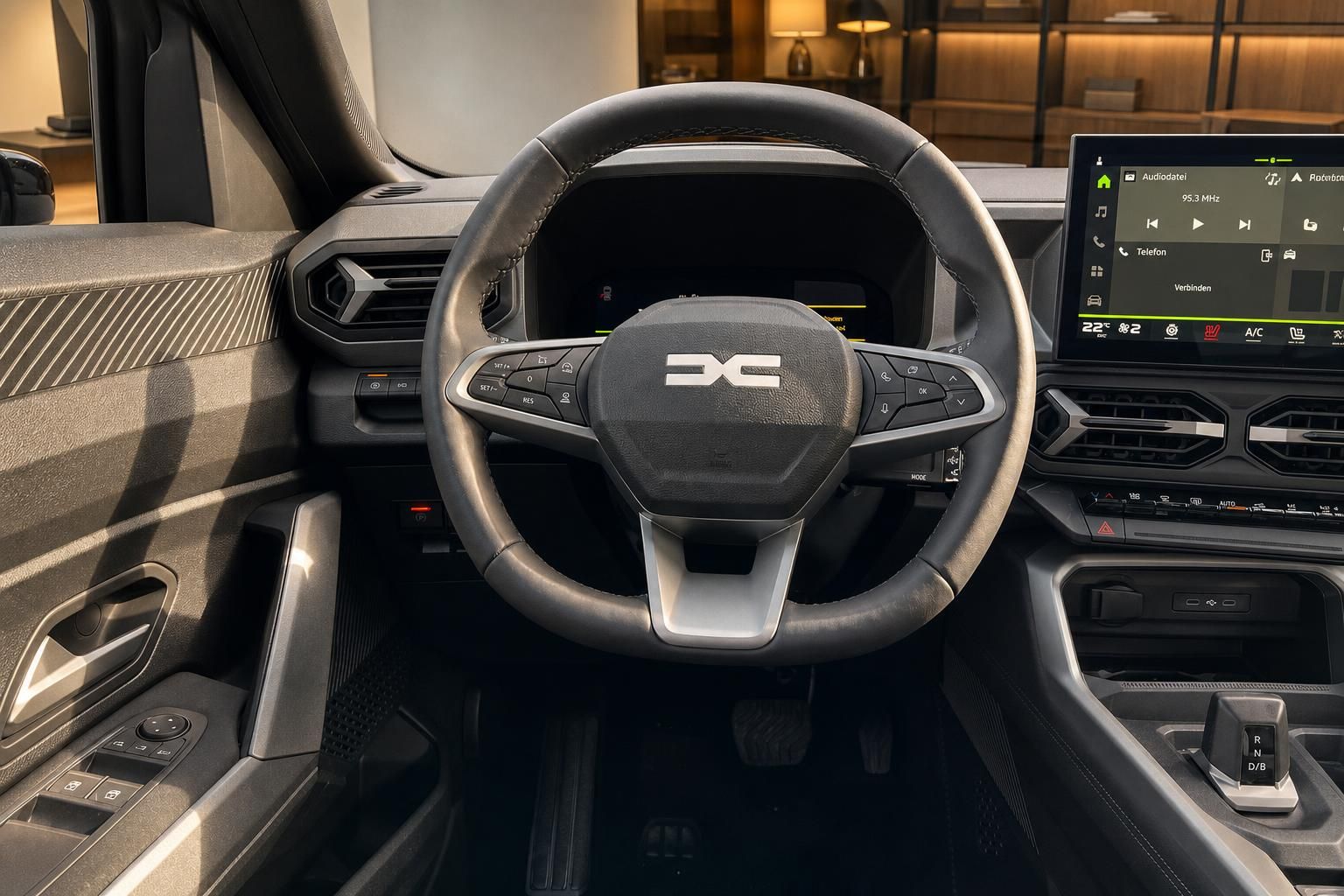 Fahrzeug-Innenraum mit Lenkrad, digitalem Cockpit und Infotainment-Display im modernen Design