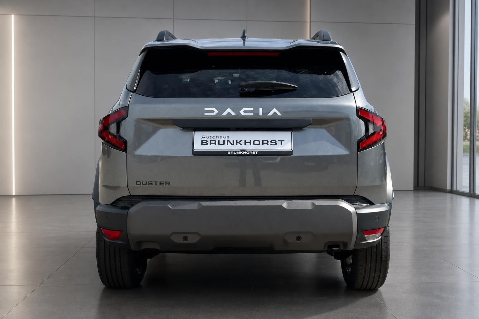 Dacia Duster grau Heckansicht mit Kennzeichenhalter Brunkhorst