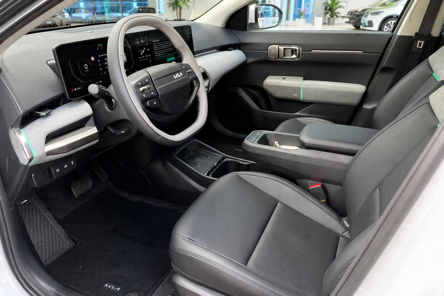 Kia EV4 Innenraum Vordersitze, Lenkrad und Cockpit Ansicht