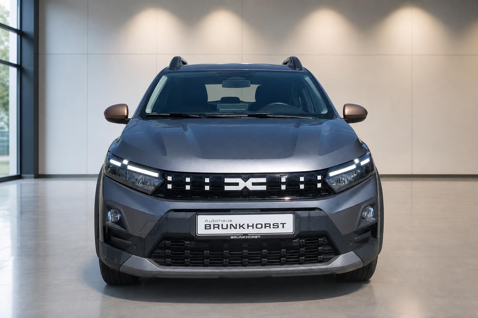Dacia Sandero Stepway grau, Frontalansicht mit LED-Scheinwerfern