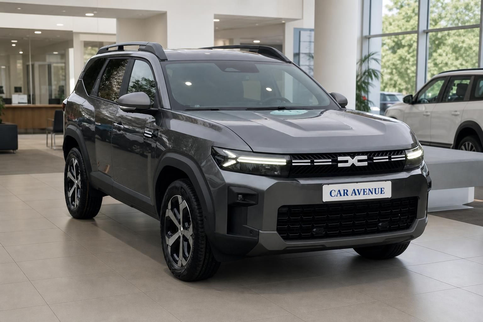 Dacia Bigster SUV grau Frontansicht schräg mit moderner LED-Beleuchtung
