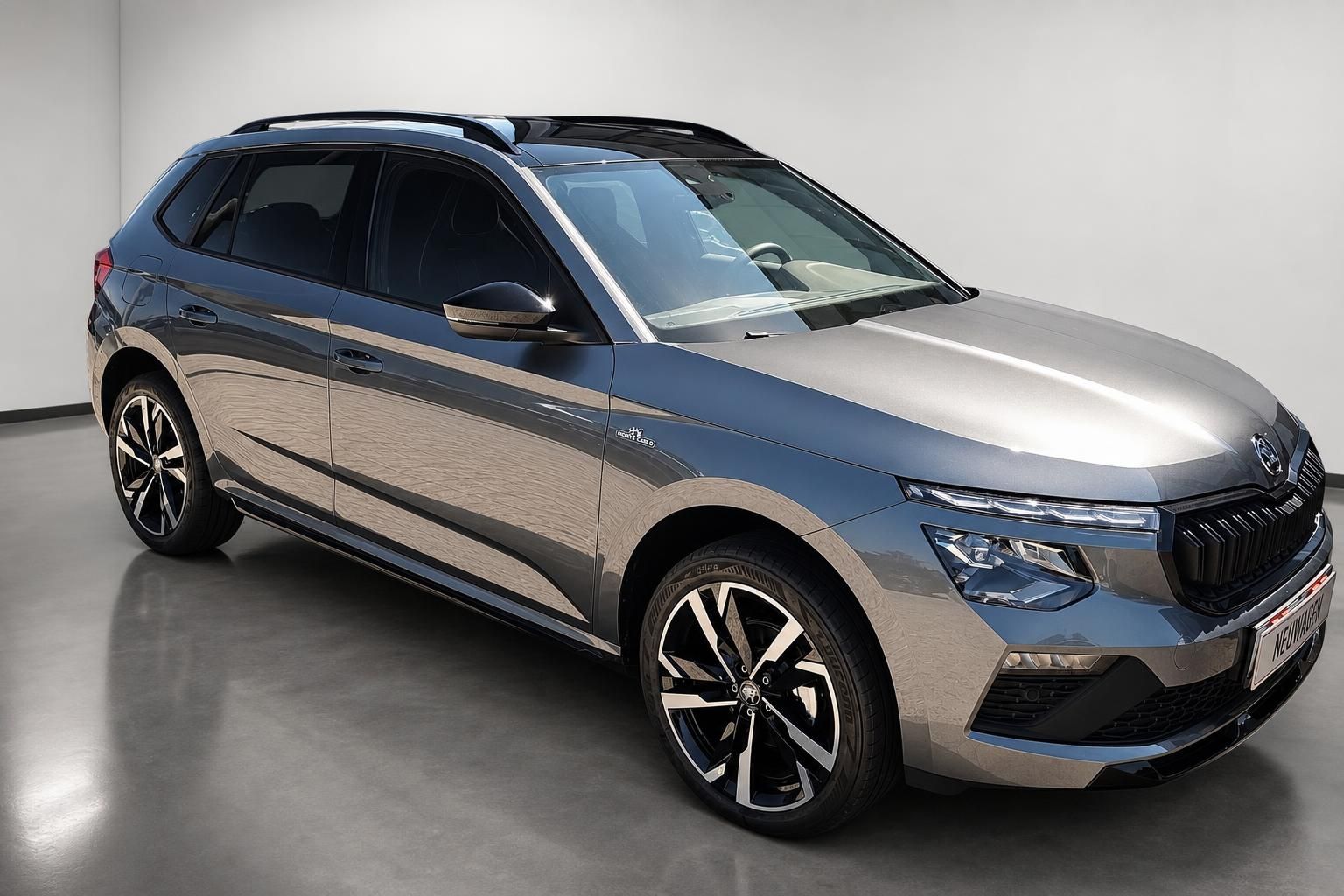 Skoda Kamiq Neuwagen Seiten-Frontansicht in Metallic-Grau