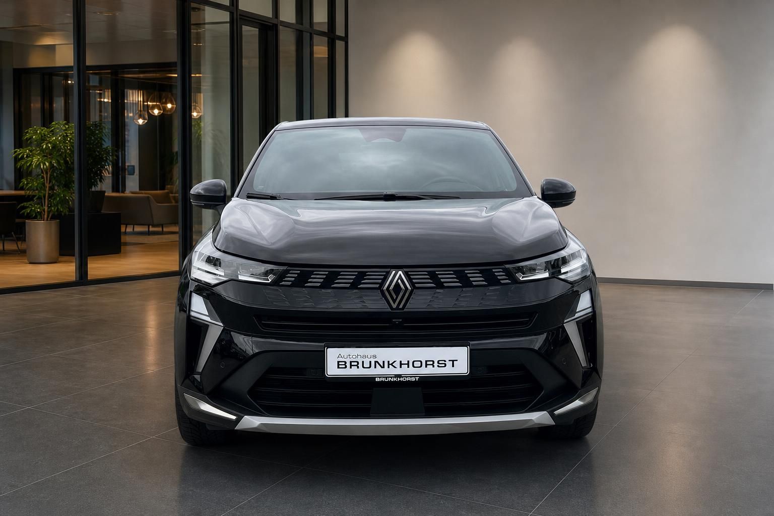 Renault Symbioz schwarz Frontansicht mit LED-Scheinwerfern im Autohaus