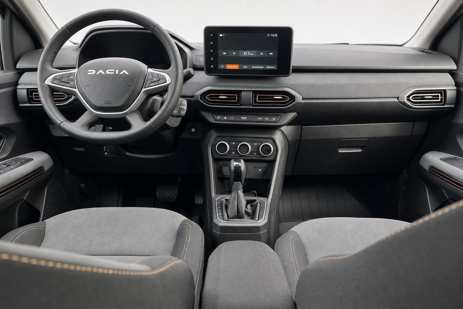 Dacia Innenraum mit modernem Dashboard, Touchscreen-Display und grau-schwarzer Ausstattung