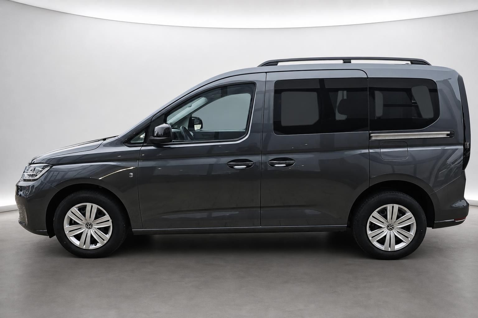VW Caddy grau metallic Seitenansicht im Studio
