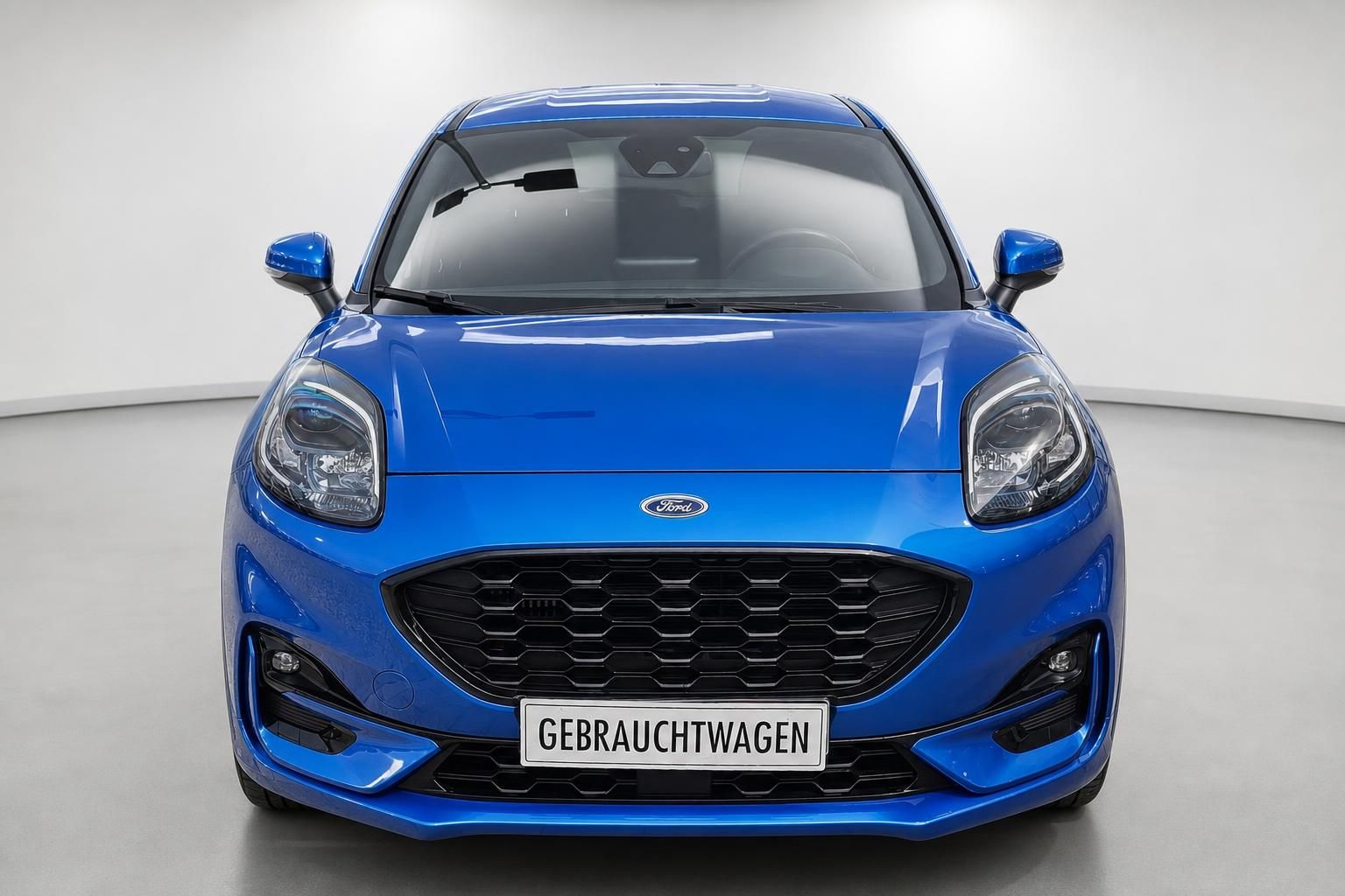 Ford Puma blau Frontansicht Gebrauchtwagen mit Kuehlergrill