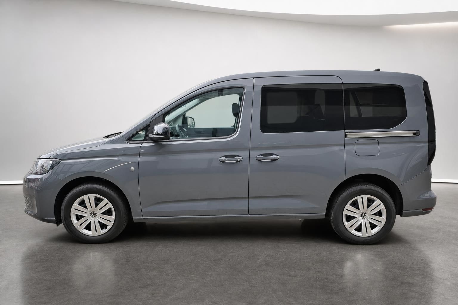 VW Caddy grau Seitenansicht Studio