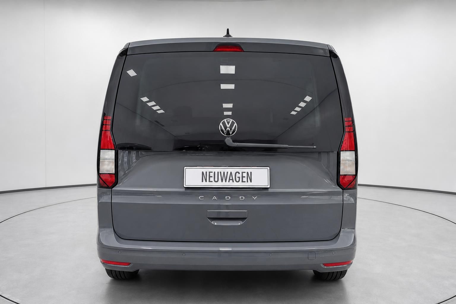 VW Caddy grau Heckansicht mit Kennzeichenhalter Neuwagen