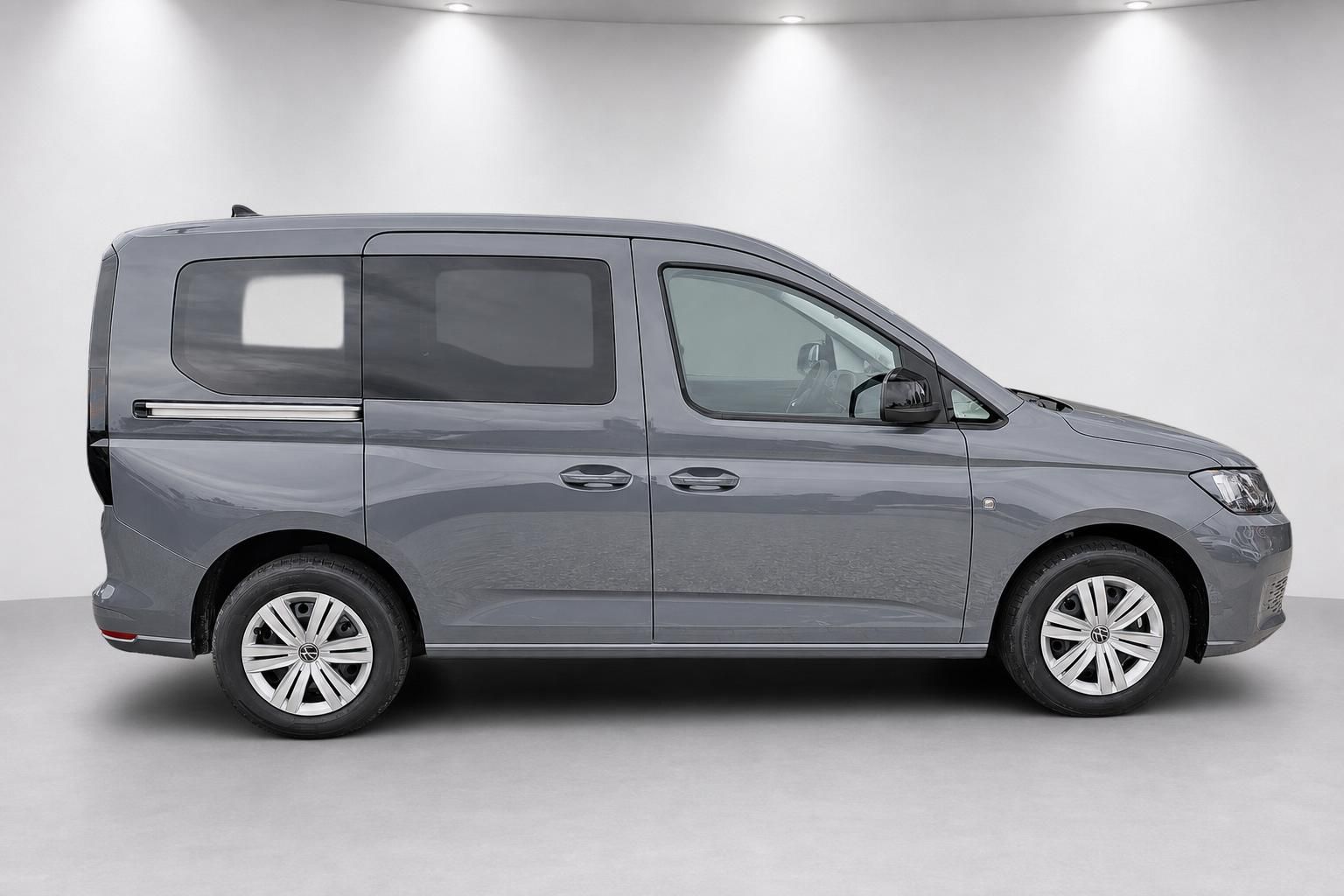 VW Caddy grau Seitenansicht Neuwagen im Studio