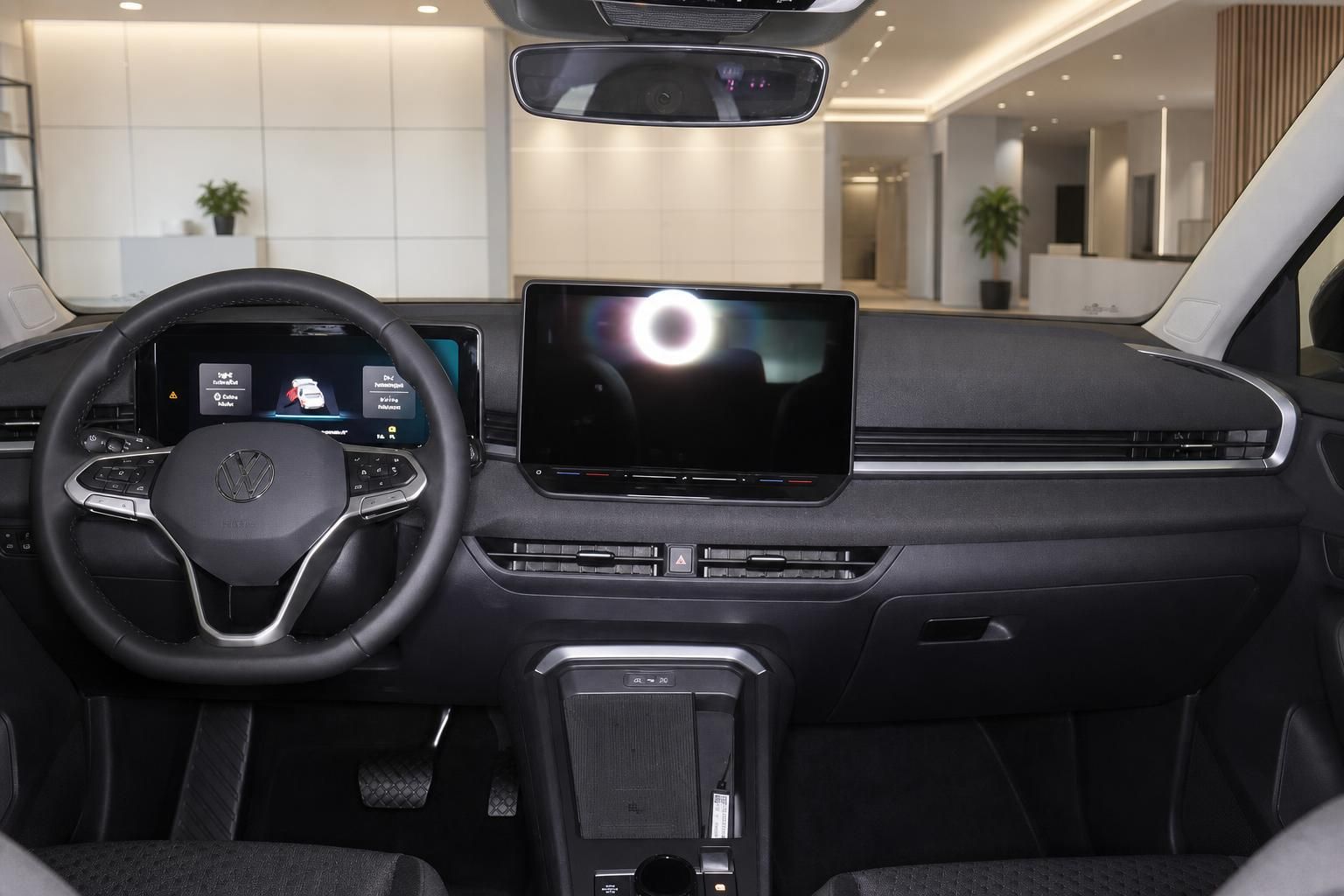 VW Cockpit mit Lenkrad und großem Touchscreen-Display