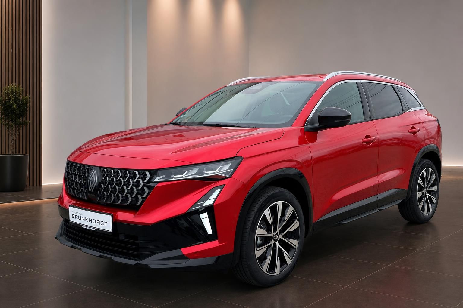 Roter Renault Austral SUV Seitenansicht mit modernem Design und Allradfelgen